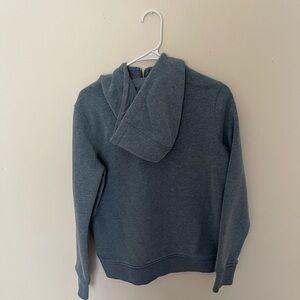 Gray blue Women’s Carhartt half zip hoodie.